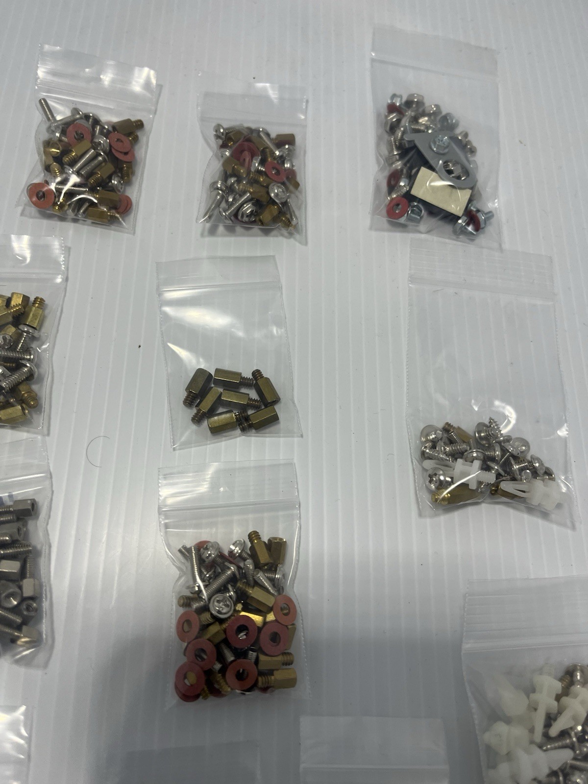 Lot Of Computer Board Screws And Parts
