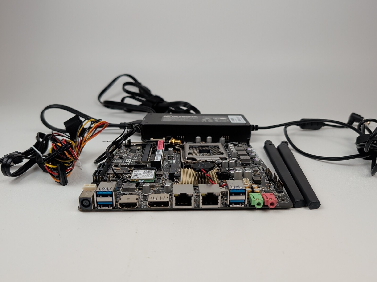 ASUS H110T LGA1151 Motherboard Intel Mini-ITX w/ I/O Shield, Wifi, Power Adapter