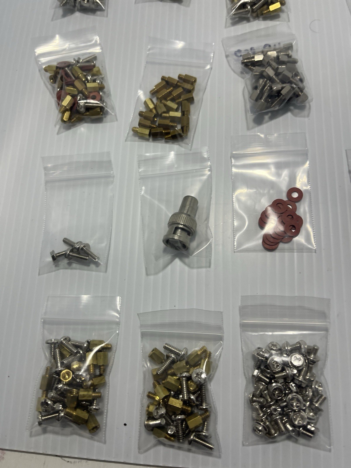 Lot Of Computer Board Screws And Parts