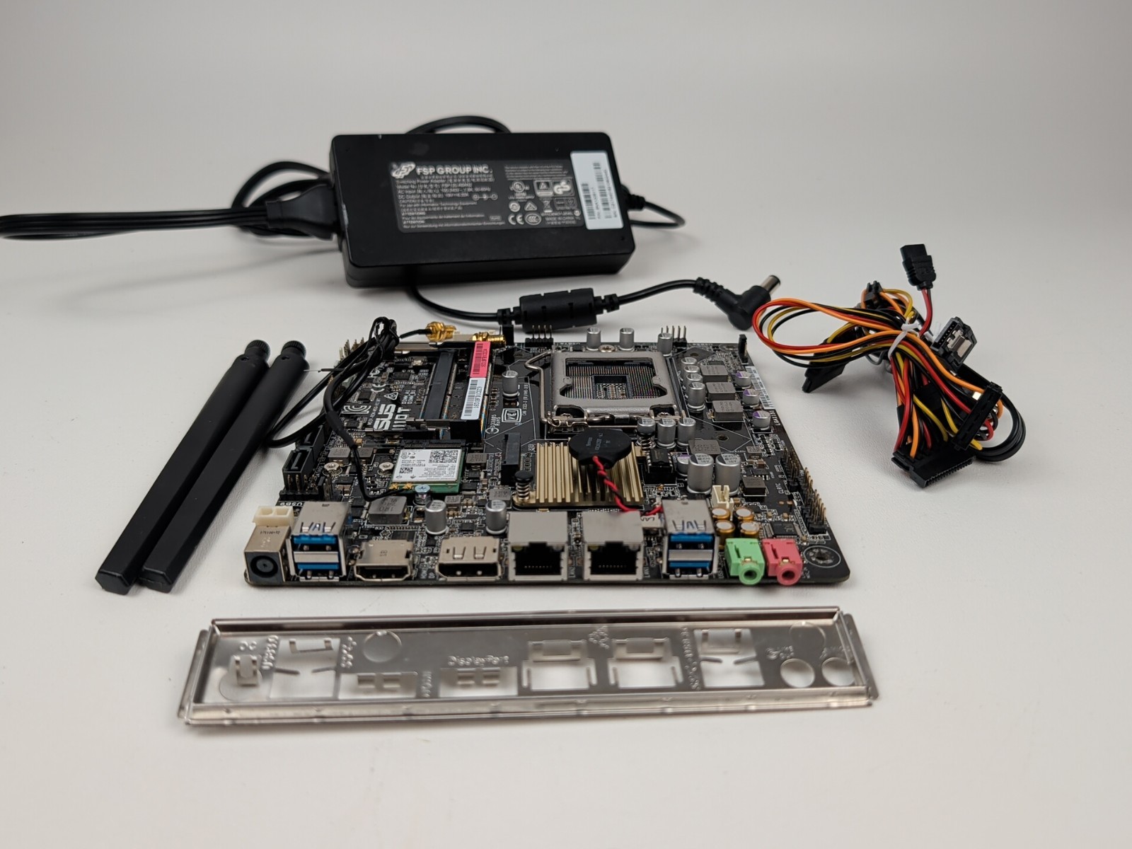 ASUS H110T LGA1151 Motherboard Intel Mini-ITX w/ I/O Shield, Wifi, Power Adapter