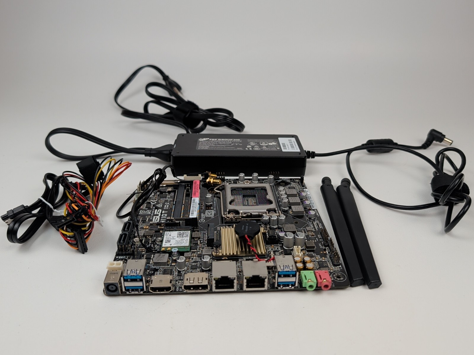 ASUS H110T LGA1151 Motherboard Intel Mini-ITX w/ I/O Shield, Wifi, Power Adapter