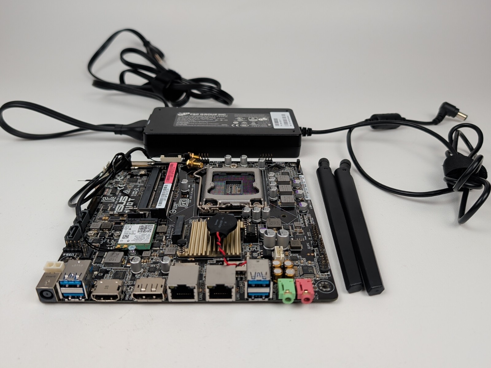 ASUS H110T LGA1151 Motherboard Intel Mini-ITX w/ I/O Shield, Wifi, Power Adapter