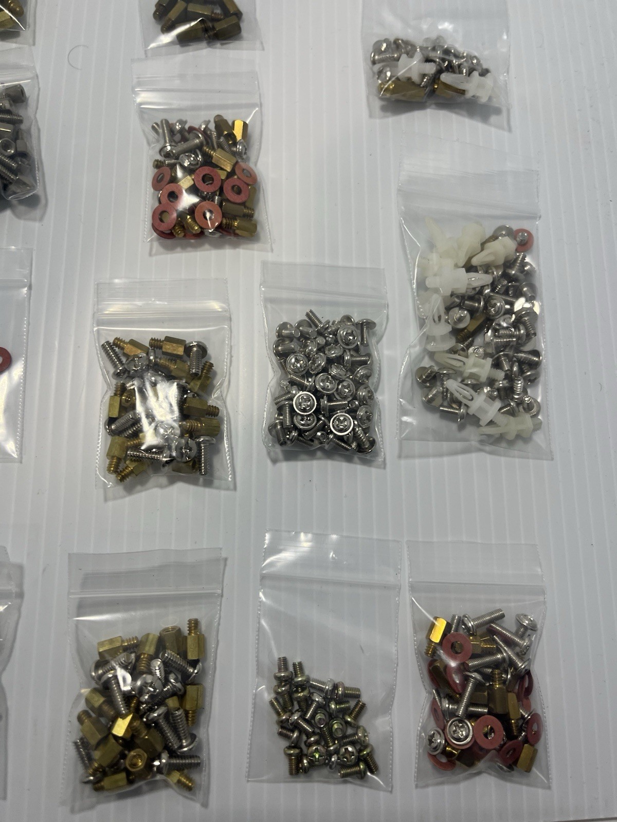 Lot Of Computer Board Screws And Parts
