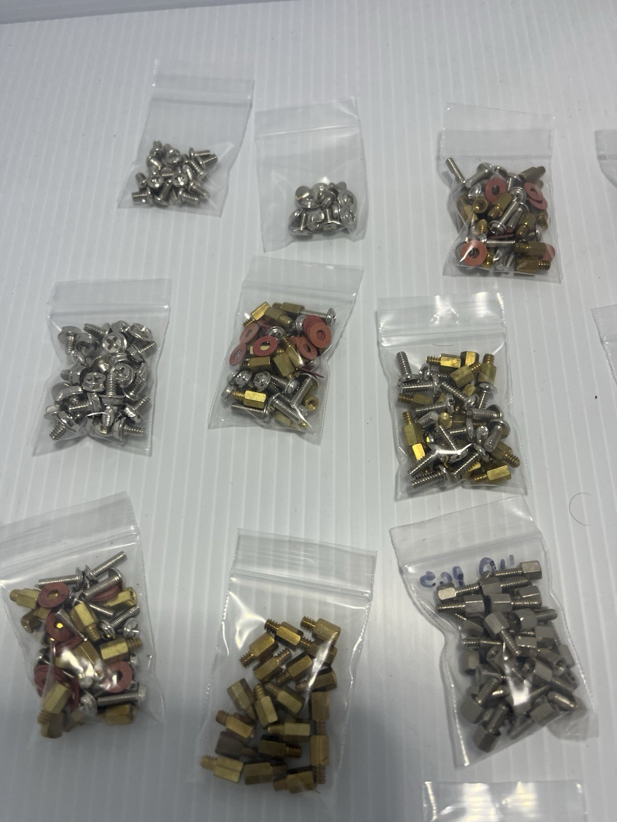 Lot Of Computer Board Screws And Parts